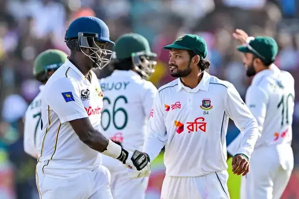 Najmul congratulates Matthews after his successful career