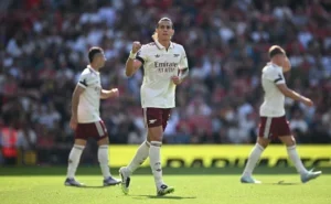 Arsenal's Riccardo Calafiori celebrates after scoring against Manchester United